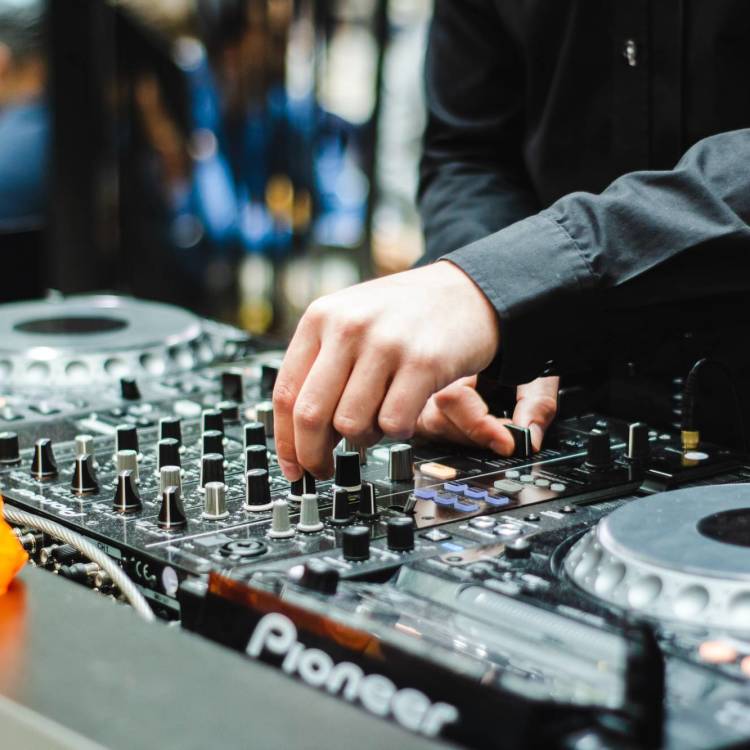 Crafting the Perfect Soundtrack: A Guide to Hiring the Right DJ for Your Event